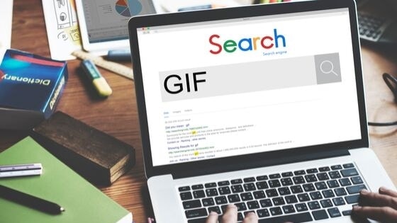 An image of laptop with Google search open searching for the word GIF